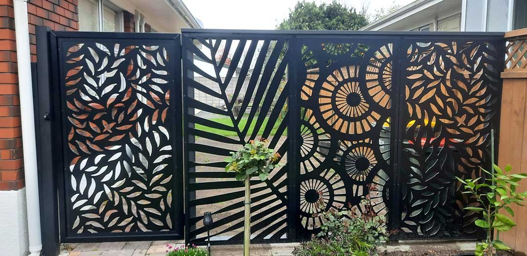 Laser cut panel with sliding gate